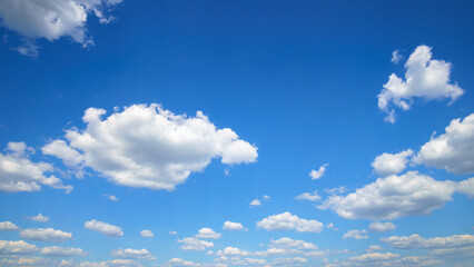 Wall Mural - beautiful blue sky with soft white clouds for abstract background