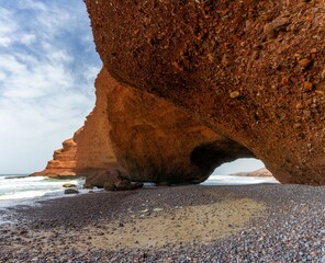 Poster - view of the beach and rock arch at Legzira on the Atlantic Coast of Morocco