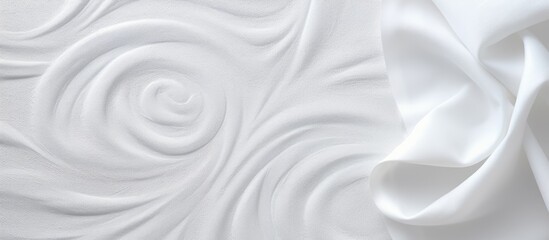Fototapete - A mock up of a white cotton towel on a background with an abstract design The fabric resembles artistic grey wale linen canvas making it suitable for use as a cloth wallpaper blanket or curtain with