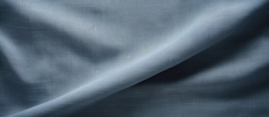 Leinwandbilder - A textured gray fabric background made of linen or cotton showcasing the woven texture of a blue gray cloth It s a natural and eco friendly textile copy space image