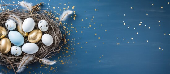 Poster - A festive Easter greeting card with a background featuring white and golden eggs quail eggs and feathers arranged on a blue table The top view allows for copy space and the minimal Easter card concep