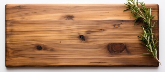 Poster - A flat lay view of a wooden cutting board made from olive tree placed on a white background The image emphasizes a cooking and recipe concept with an empty space for customization. Creative banner
