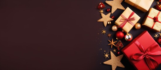 Leinwandbilder - Christmas decorations and gift box arranged in a top view flat lay The composition is placed on a colored background providing the perfect copy space image for Christmas or Happy New Year greetings