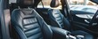 © ALEXSTUDIO - Luxurious black leather car seats in modern vehicle