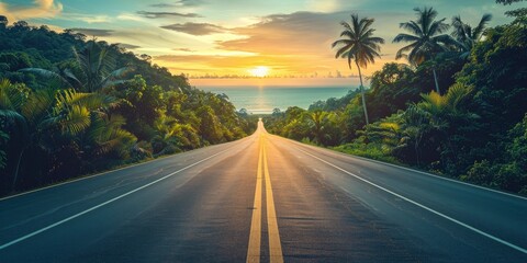 Empty highway, dense tropical forest on one side of the road and sea coast on the other, , sky illuminated by the sun's rays at sunset, incredible nature
