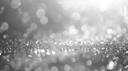 Wall Mural - A sparkling silver bokeh background, ideal for elegant and festive designs.