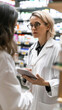 © GoodandEvil - Pharmacist engaging with a client