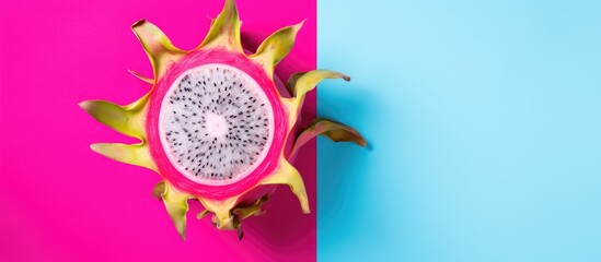 Wall Mural - Tasty dragon fruit on color background. Creative banner. Copyspace image