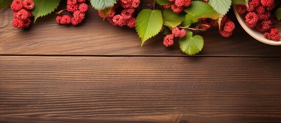 Aufkleber - Fruit tea with berries viburnum on a wooden surface top view. Creative banner. Copyspace image