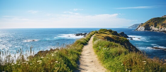 Poster - walkway at seaside cliff against blue sea and sky. Creative banner. Copyspace image