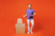 © ViDi Studio - Full body young smiling happy man wear purple t-shirt casual clothes stand show point fingers on stack of blank heavy cardboard boxes isolated on red orange wall background studio. Lifestyle concept.