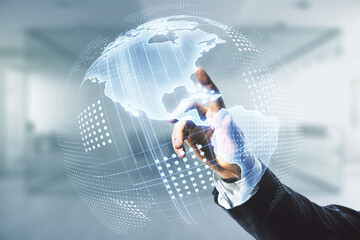 Wall Mural - man hand clicks on digital map of north america hologram on blurred office background, global techno