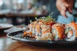 © spyrakot - Fresh Gluten-Free Sushi Rolls with Fresh Fish and Vegetables at a Modern Japanese Restaurant