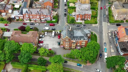 Wall Mural - Aerial drone footage of the town centre of Scarborough in the UK, showing the British residential housing estates and historical town houses along side the main roads in the seaside town