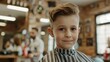 © David - Smiling boy in a barber chair at a classic barbershop