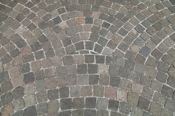 Wall Mural - Paving stone pavement texture. Cobblestone pavement top view. Old stone sidewalk. Paving texture. Cobble stone road cobble texture. Cobblestone background. Old pavement background. Cobblestone road