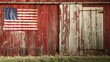 © Artyom - American flag on weathered barn wall with grass
