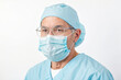 © Rysak - Close-up Portrait of a Male Doctor in Scrubs and a Face Mask