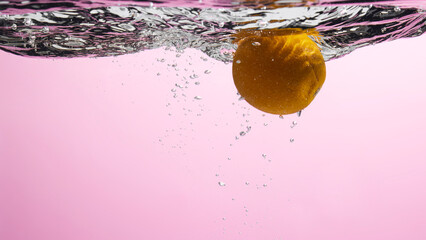 Wall Mural - Fresh fruit falling into the water.
Organic fruits for making effective juices for dieting.