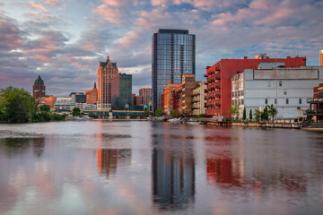 Wall Mural - Milwaukee, Wisconsin, USA. Cityscape image of downtown Milwaukee, Wisconsin, USA with reflection of the skyline in Mnemonee River at summer sunset.