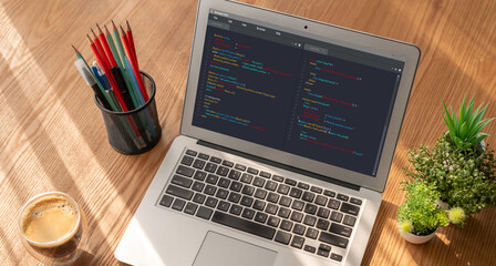 Software development programming on computer screen for modish application and program coding
