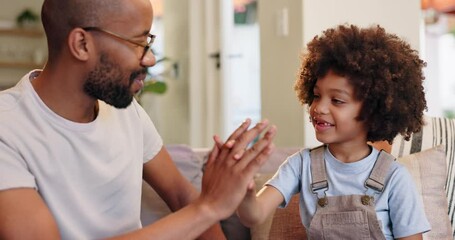 Canvas Print - Black family, high five and bonding of father with son sitting on sofa with smile. Happiness, affection and child playing with single dad in home childhood, celebration and relax together on couch