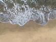 © 1 MEDIA - Beach shore wave background view from above