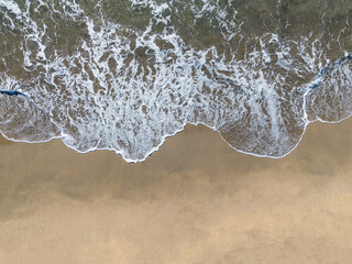 beach shore wave background view from above