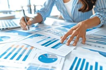 Female administrator reviewing financial documents, using calculator - income audit, balance sheet management, business finance