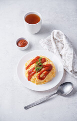 Wall Mural - Omurice with ketchup sauce in a plate