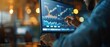 © Naret - Person analyzing financial data on computer screen with charts, graphs, and stock market information in a contemporary office setting.