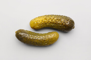 Wall Mural - Pickled cucumbers on grey background