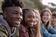 © Inigo - Group of happy young african american friends smiling at camera.