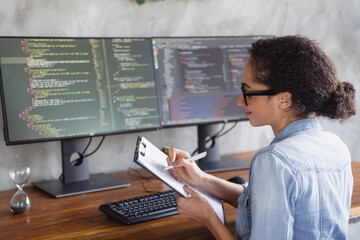 portrait of young girl it specialist pen write clipboard loft interior business center indoors