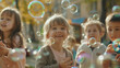 © malik - Multi-ethnic group of little friends with toothy smiles on their faces enjoying warm sunny day while participating in soap bubbles show