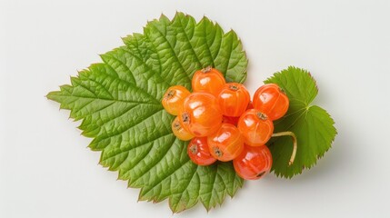 Wall Mural - Cloudberries with a green leaf on a white background