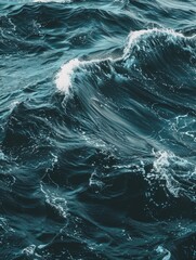 Wall Mural - the ocean is calm and peaceful, with a gentle wave rolling in