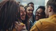 © Ilia Nesolenyi - A close-up photo of four friends huddled together, laughing and sharing stories. Their expressions show genuine joy and connection, capturing the essence of friendship