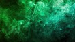 © TheWaterMeloonProjec - Thick green multi hued smoke against a dark background isolated image Smoke vape background