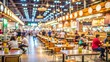 © NHA Studio - Food Court Blur: A blurred background of a bustling food court in a shopping mall, with various food stalls and seating areas.