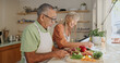 © Charlize Davids/peopleimages.com - Kitchen, vegetables and elderly couple with cooking for healthy dinner, nutrition or bonding. Retirement, senior man and woman with ingredients at home for meal prep, support or happiness in marriage
