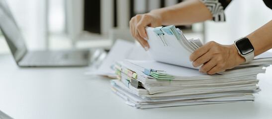 business documents, auditor businesswoman checking searching document legal prepare paperwork or rep