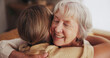 © Azeemud/peopleimages.com - Woman, love and hug senior mom in home for mothers day, bonding and visit in retirement with care or happy. Person, smile and embrace with elderly parent for reunion, comfort and affection in hospice
