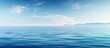 © StockKing - A serene copy space image capturing the gentle transition of the calm ocean surface