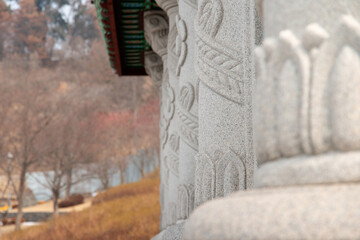 View of the stone column and the sculpture