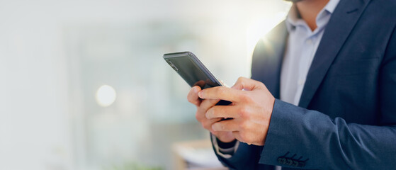 Poster - Hands, cellphone and businessman in office typing online email for communication, connectivity or networking. Technology, contact and male lawyer on phone with research for legal case in workplace.