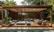 © EF Studio - A modern wooden pergola with an outdoor seating area featuring comfortable sofas and chairs