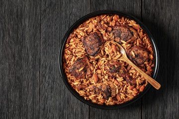 Wall Mural - baked greek chicken orzo stew in tomato sauce