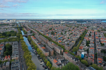 Wall Mural - Streets of Amsterdam with overlook to the central station in the distance