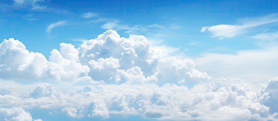 Poster - Beautiful blue sky with fluffy white clouds Copy space image